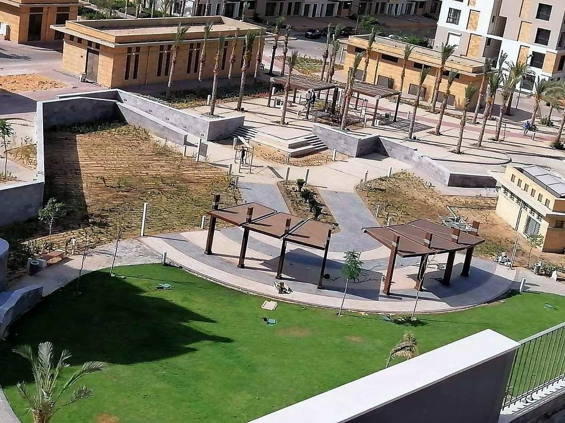 Lawn, pergolas and planting at SODIC East